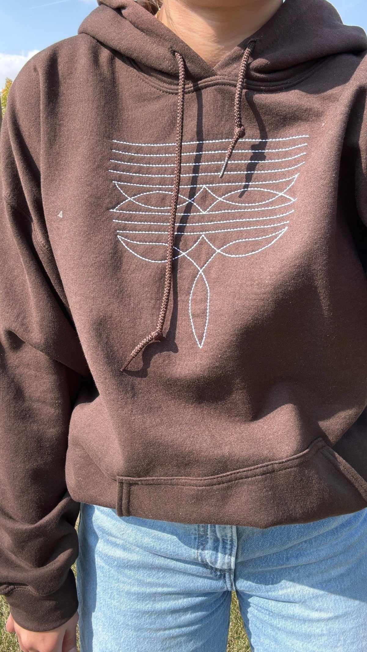 White Boot Stitch On Brown Hoodie